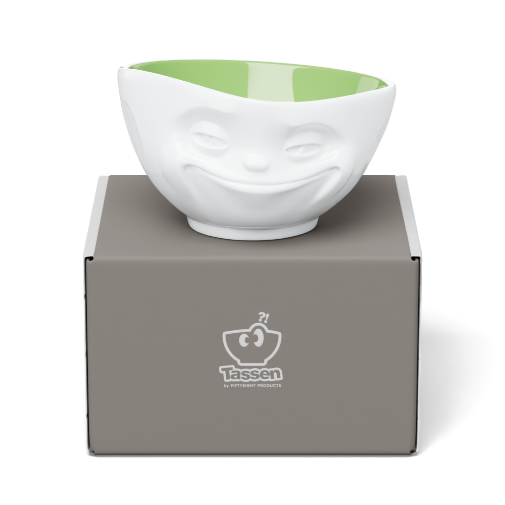 Premium porcelain bowl in white with pistachio color inside from the porcelain product family by FIFTYEIGHT Products. Offers 16 oz capacity perfect for serving cereal, soup, snacks and much more. Dishwasher and microwave safe bowl featuring a sculpted ‘grinning’ facial expression. Shipped in exclusively designed gift box.