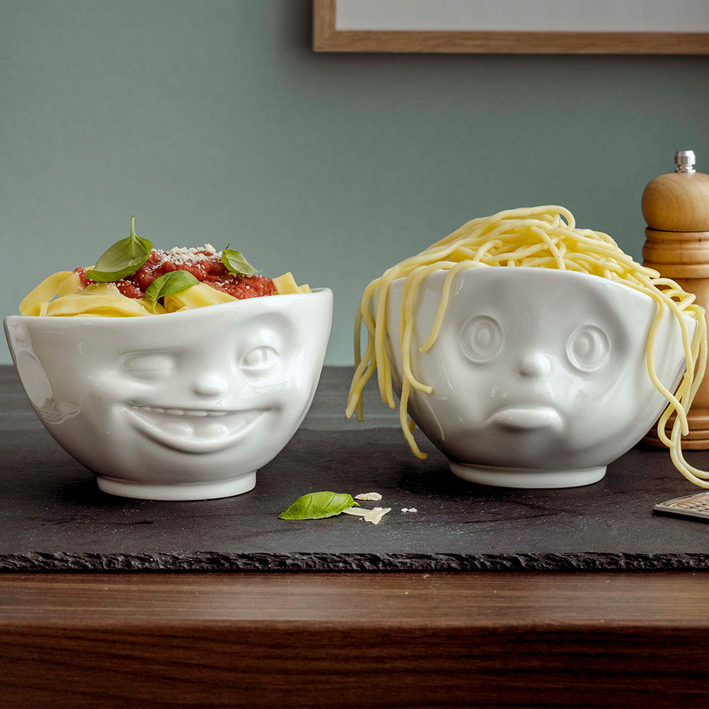 Premium porcelain bowl in white from the porcelain product family of fun dishware by FIFTYEIGHT Products. Offers 16 oz capacity perfect for serving cereal, soup, snacks and much more. Dishwasher and microwave safe bowl featuring a sculpted ‘sulking’ facial expression. Shipped in exclusively designed gift box.