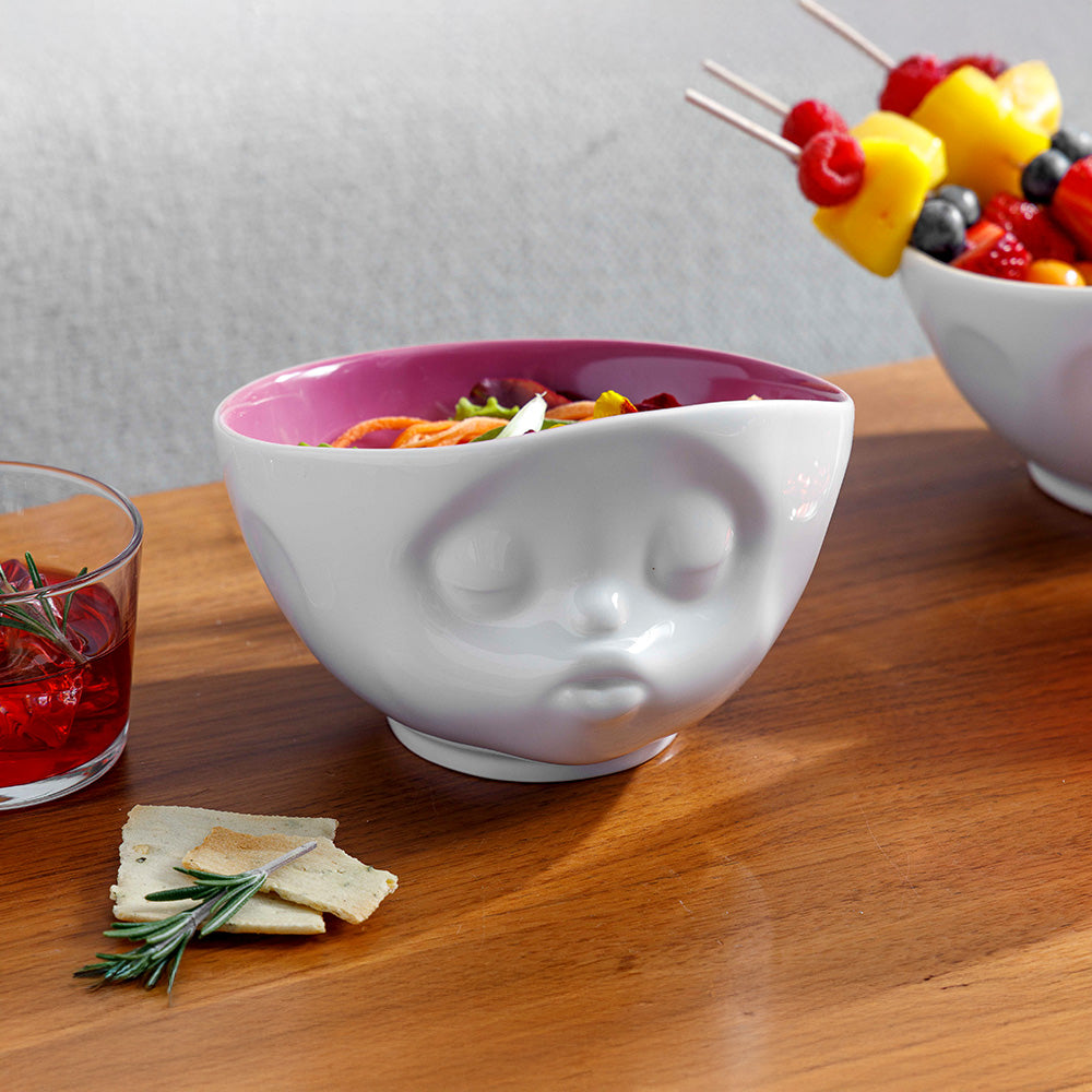 Premium porcelain bowl in white with berry color inside from the porcelain product family by FIFTYEIGHT Products. Offers 16 oz capacity perfect for serving cereal, soup, snacks and much more. Dishwasher and microwave safe bowl featuring a sculpted ‘kissing’ facial expression. Shipped in exclusively designed gift box.