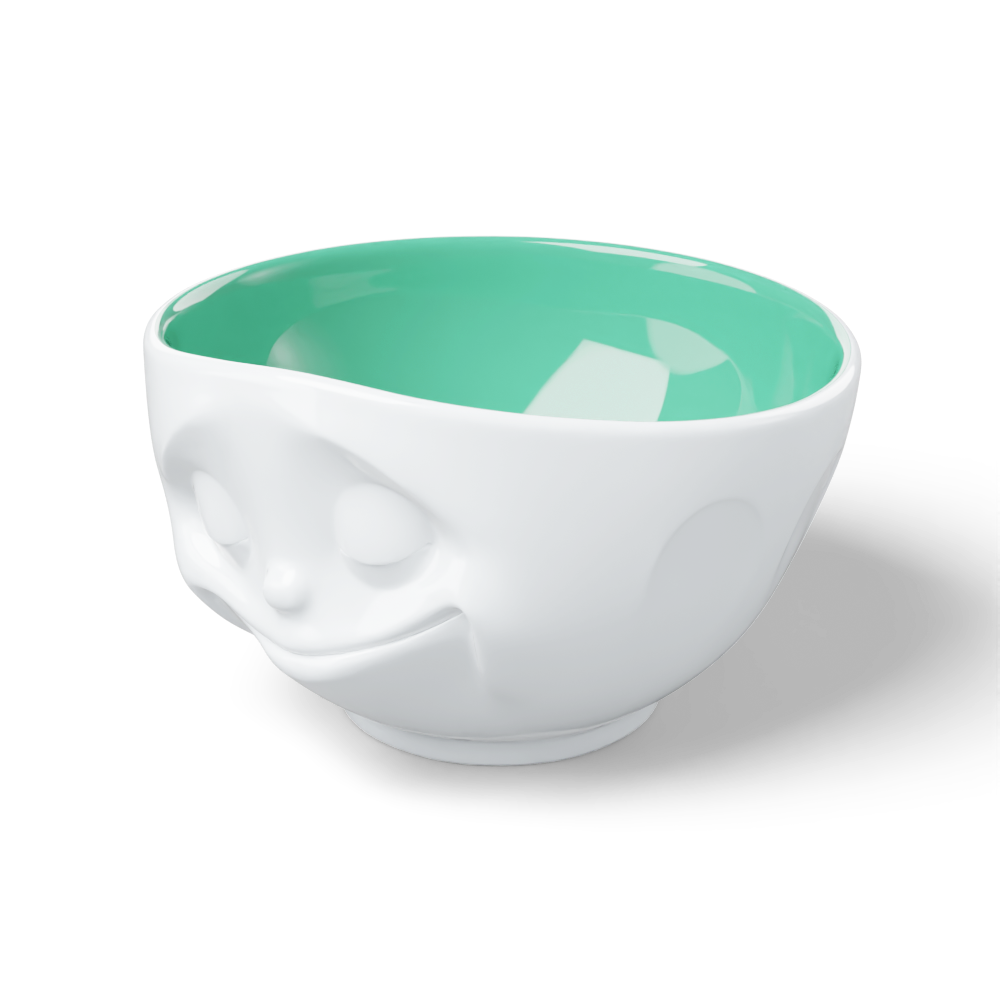 Premium porcelain bowl in white with jade color on the inside from the porcelain product family of fun dishware by FIFTYEIGHT Products. Offers 16 oz capacity perfect for serving cereal, soup, snacks and much more. Dishwasher and microwave safe bowl featuring a sculpted ‘happy’ facial expression. Shipped in exclusively designed gift box.