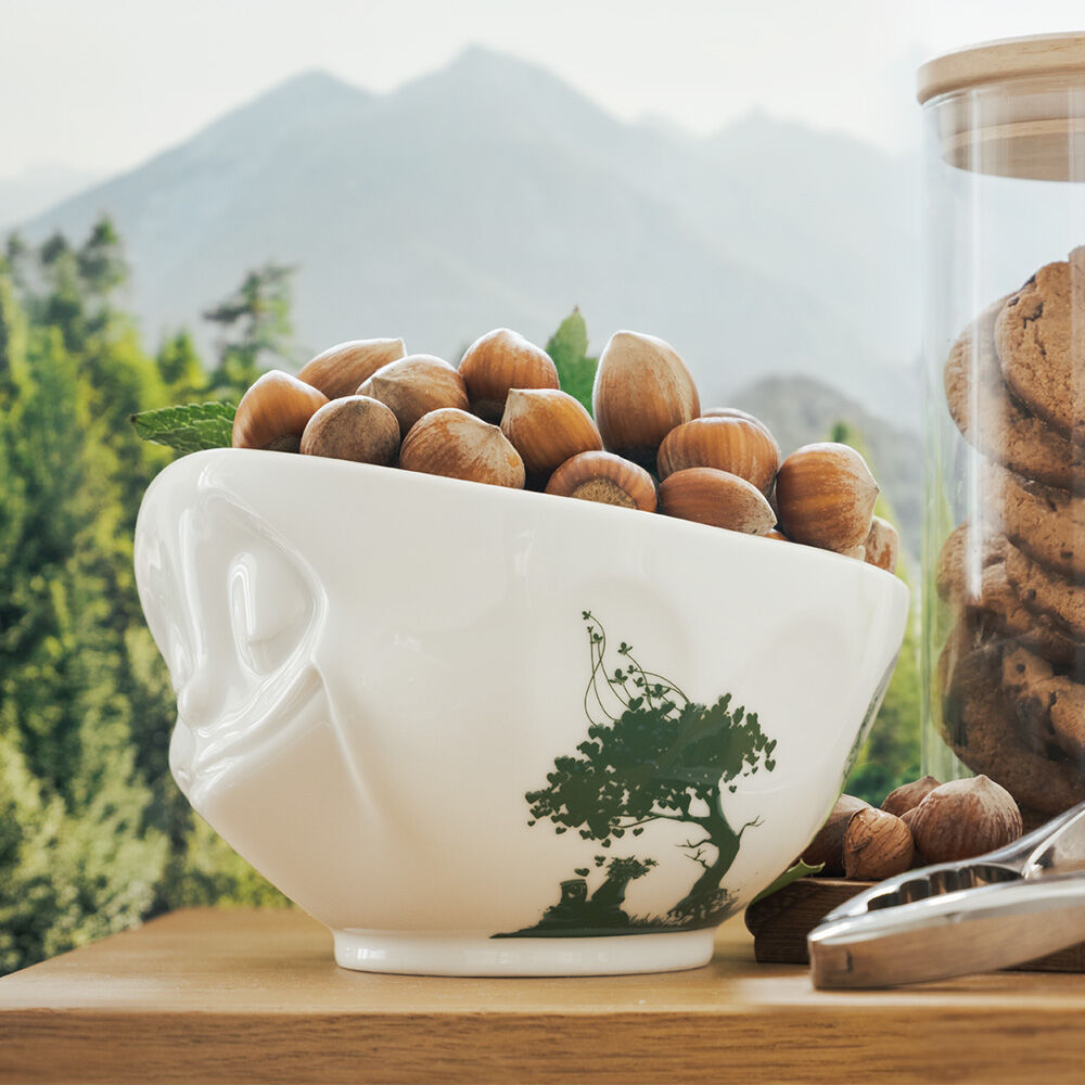 FIFTYEIGHT Products Happy FABULOUS Special Edition 16oz porcelain bowl with rich green finish and delicate nature motifs. Features signature smiling Happy face design on white porcelain with botanical artwork. Made in Germany, Limited Edition.