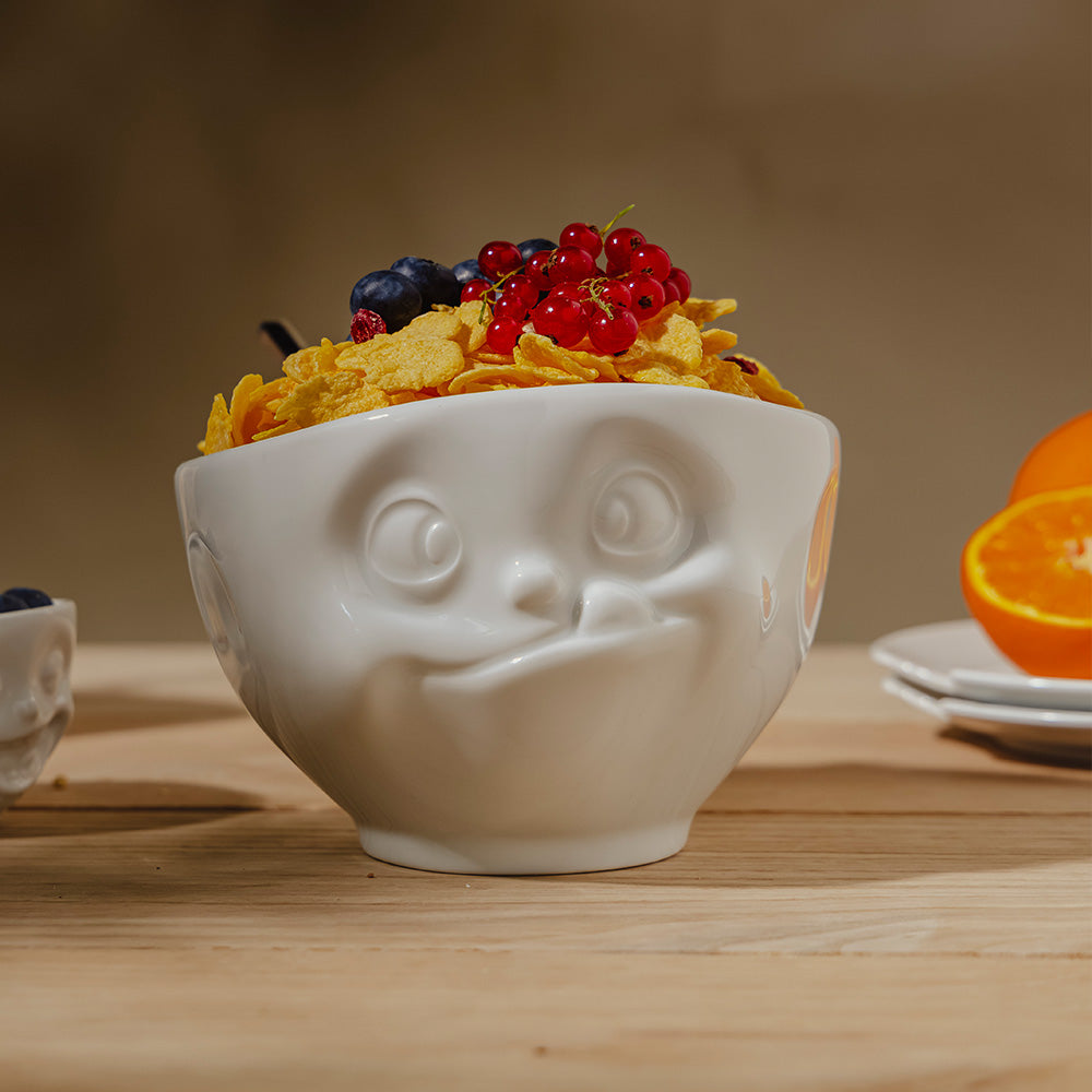 Premium porcelain bowl in white from the porcelain product family of fun dishware by FIFTYEIGHT Products. Offers 16 oz capacity perfect for serving cereal, soup, snacks and much more. Dishwasher and microwave safe bowl featuring a sculpted ‘tasty’ facial expression. Shipped in exclusively designed gift box.