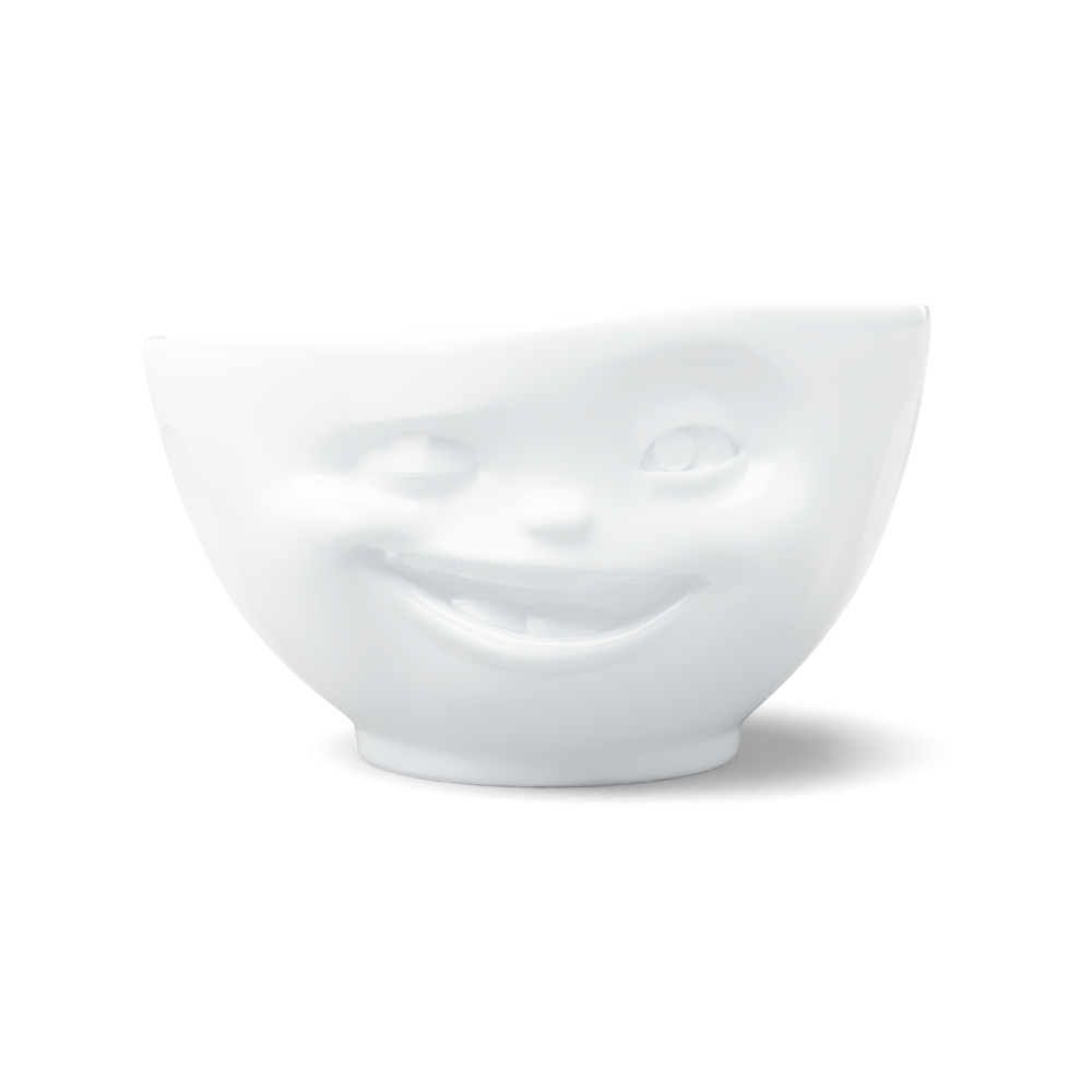 Premium porcelain bowl in white from the porcelain product family of fun dishware by FIFTYEIGHT Products. Offers 16 oz capacity perfect for serving cereal, soup, snacks and much more. Dishwasher and microwave safe bowl featuring a sculpted ‘winking’ facial expression. Shipped in exclusively designed gift box.
