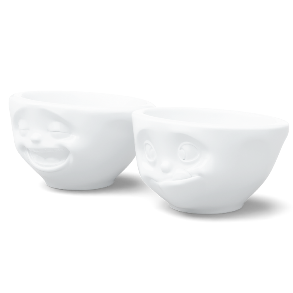 Set of two 3.3 oz. bowls in white from the porcelain product family of fun dishware by FIFTYEIGHT Products. Perfect for serving dips, sauces, nuts, sugar, spices, espresso, jam, honey, and more. Dishwasher and microwave safe bowls featuring 'laughing' and 'tasty' faces. Shipped in exclusively designed gift box.