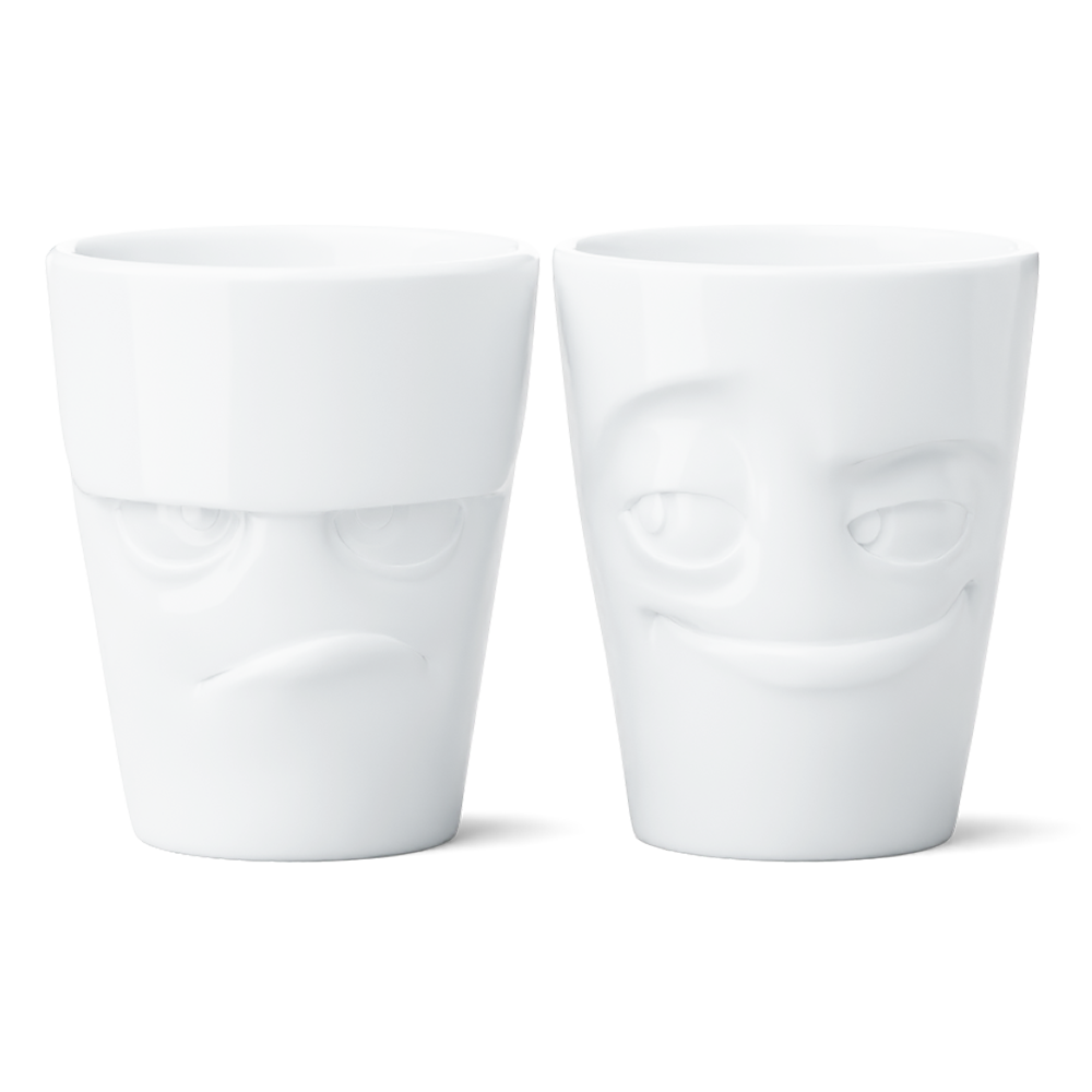 Set of two coffee mugs without handles in white from the porcelain product family of fun dishware by FIFTYEIGHT Products. Each offering 11 oz capacity. Dishwasher and microwave safe coffee cups with 'Grumpy' and 'Impish' facial expression. Shipped in exclusively designed gift box.
