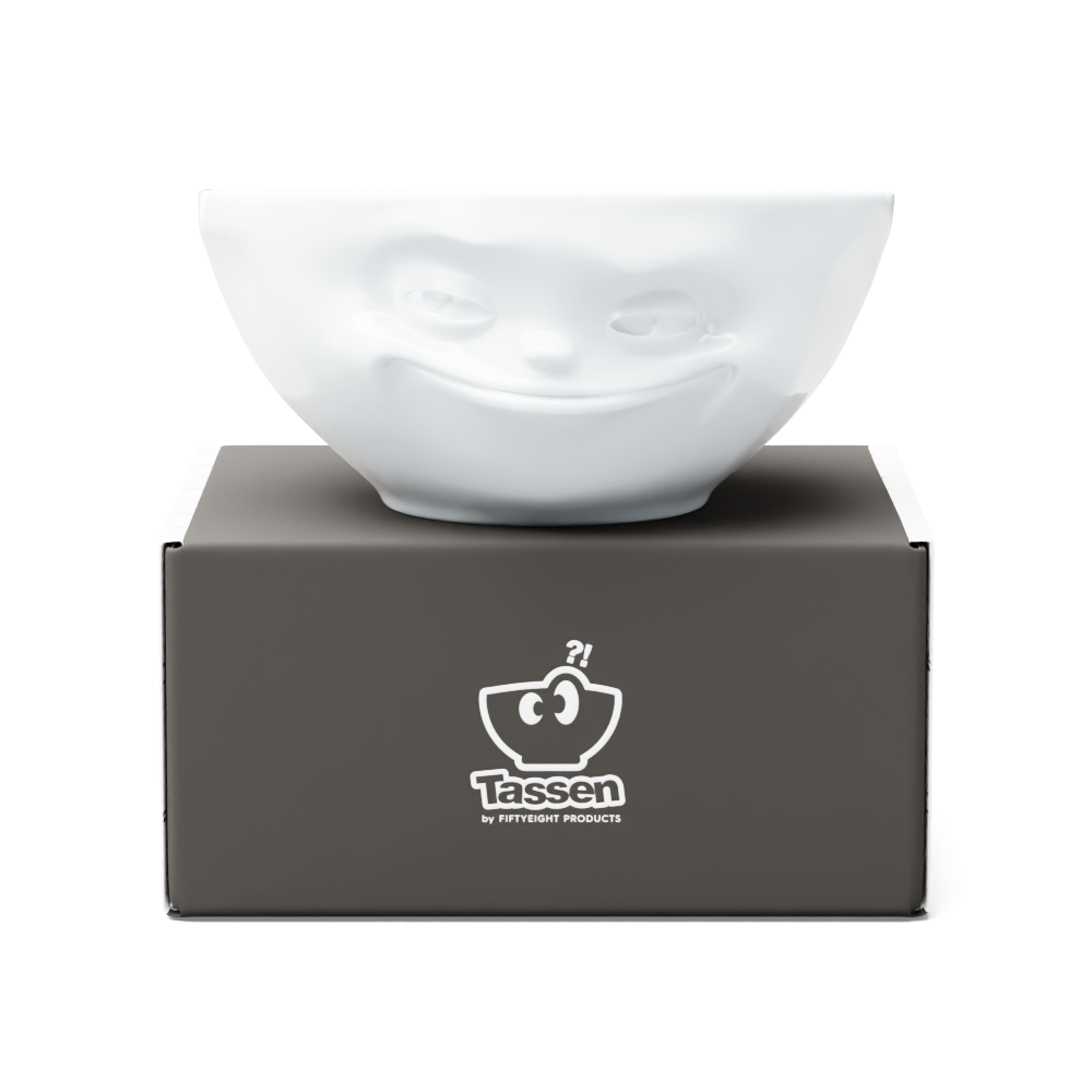 Premium porcelain bowl in white from the porcelain product family of fun dishware by FIFTYEIGHT Products. Offers 11 oz capacity perfect for serving ice cream to tapas, nuts and hearty dips. Dishwasher and microwave safe bowl featuring a sculpted ‘grinning’ facial expression. Shipped in exclusively designed gift box.