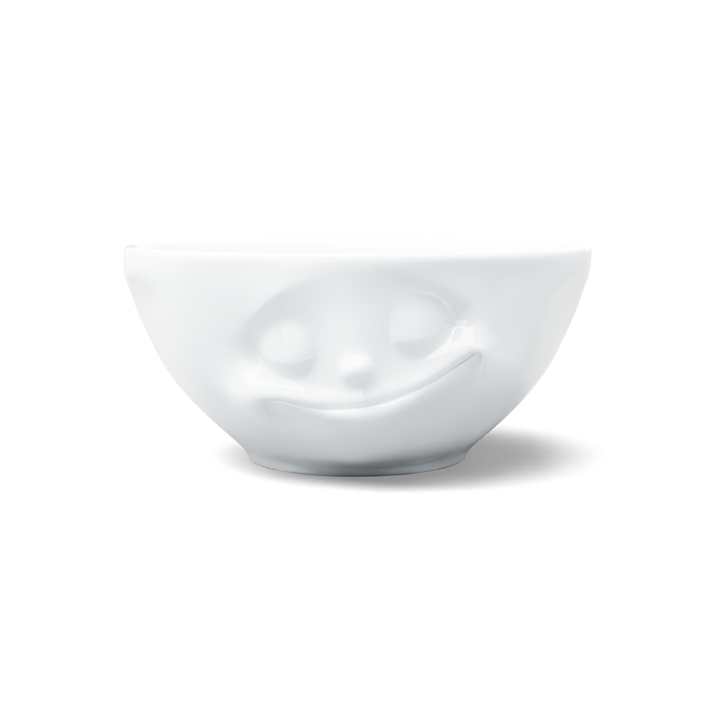 Premium porcelain bowl in white from the porcelain product family of fun dishware by FIFTYEIGHT Products. Offers 11 oz capacity perfect for serving ice cream to tapas, nuts and hearty dips. Dishwasher and microwave safe bowl featuring a sculpted ‘happy’ facial expression. Shipped in exclusively designed gift box.