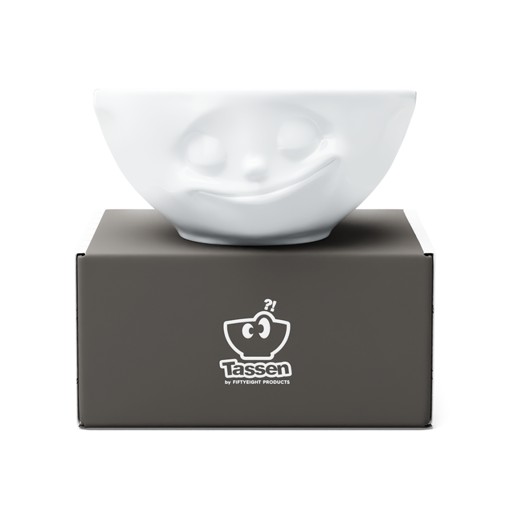 Premium porcelain bowl in white from the porcelain product family of fun dishware by FIFTYEIGHT Products. Offers 11 oz capacity perfect for serving ice cream to tapas, nuts and hearty dips. Dishwasher and microwave safe bowl featuring a sculpted ‘happy’ facial expression. Shipped in exclusively designed gift box.
