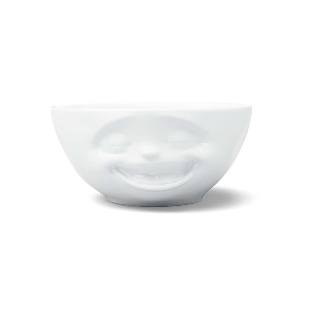 Premium porcelain bowl in white from the porcelain product family of fun dishware by FIFTYEIGHT Products. Offers 11 oz capacity perfect for serving ice cream to tapas, nuts and hearty dips. Dishwasher and microwave safe bowl featuring a sculpted ‘laughing’ facial expression. Shipped in exclusively designed gift box.