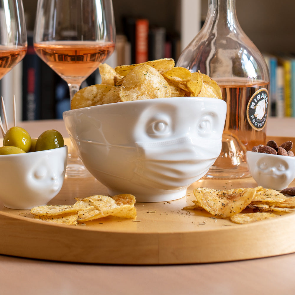 Premium porcelain bowl in white from the porcelain product family of fun dishware by FIFTYEIGHT Products. Offers 16 oz capacity perfect for serving cereal, soup, snacks and much more. Dishwasher and microwave safe bowl featuring a sculpted ‘hopeful’ facial expression and mask. Shipped in exclusively designed gift box.