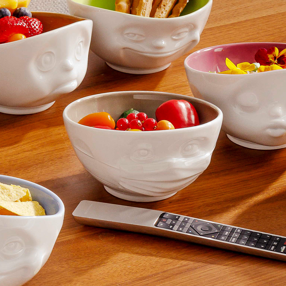 Premium porcelain bowl in white from the porcelain product family of fun dishware by FIFTYEIGHT Products. Offers 16 oz capacity perfect for serving cereal, soup, snacks and much more. Dishwasher and microwave safe bowl featuring a sculpted ‘hopeful’ facial expression and mask. Shipped in exclusively designed gift box.