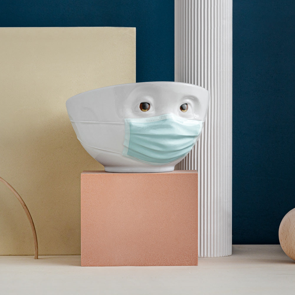 Premium porcelain bowl with colorful accents from porcelain product family of fun dishware by FIFTYEIGHT Products. Offers 16 oz capacity perfect for serving cereal, soup, snacks and much more. Dishwasher and microwave safe bowl featuring a ‘hopeful’ facial expression and colorful eyes and blue mask. Shipped in gift box.