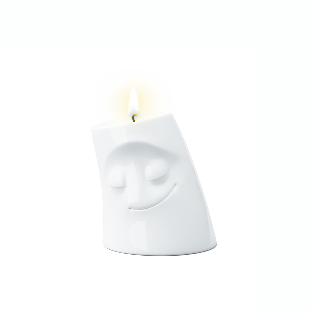 Exclusive designer candle holder with COZY facial expression. Stands at 3.3 inches tall on a footed base and fits a tea light or LED light. From the TASSEN product family of fun dishware by FIFTYEIGHT Products. Made in Germany according to environmental standards.
