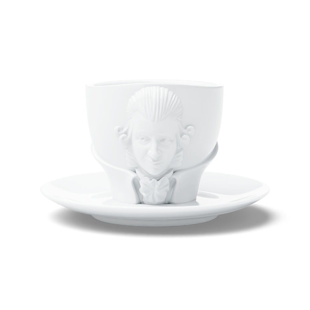 Premium porcelain coffee cup with saucer in white with sculpted Wolfgang Amadeus Mozart face. Dishwasher and microwave safe cup at 8.7 oz capacity. From the TALENT product family of cups dedicated to creative geniuses by FIFTYEIGHT Products. Made in Germany according to environmental standards.