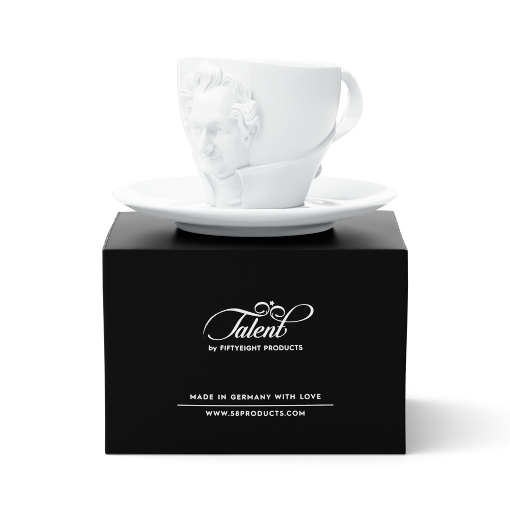 Premium porcelain coffee cup with saucer in white with sculpted Johann Wolfgang von Goethe face. Dishwasher and microwave safe cup at 8.7 oz capacity. From the TALENT product family of cups dedicated to creative geniuses by FIFTYEIGHT Products. Made in Germany according to environmental standards.