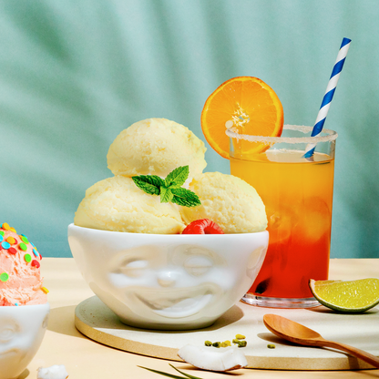 Premium porcelain bowl in white from the porcelain product family of fun dishware by FIFTYEIGHT Products. Offers 11 oz capacity perfect for serving ice cream to tapas, nuts and hearty dips. Dishwasher and microwave safe bowl featuring a sculpted ‘laughing’ facial expression. Shipped in exclusively designed gift box.