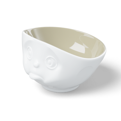 Premium porcelain bowl in white with sand color on the inside from the porcelain product family by FIFTYEIGHT Products. Offers 16oz capacity perfect for serving cereal, soup, snacks and much more. Dishwasher and microwave safe bowl featuring a sculpted ‘sulking’ facial expression. Shipped in exclusively designed gift box.