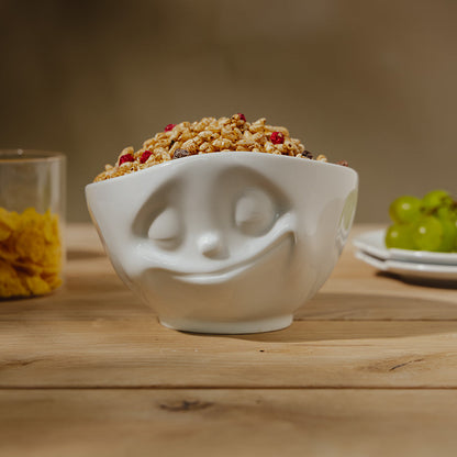 Premium porcelain bowl in white from the porcelain product family of fun dishware by FIFTYEIGHT Products. Offers 16 oz capacity perfect for serving cereal, soup, snacks and much more. Dishwasher and microwave safe bowl featuring a sculpted ‘happy’ facial expression. Shipped in exclusively designed gift box.