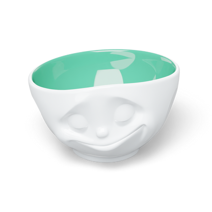 Premium porcelain bowl in white with jade color on the inside from the porcelain product family of fun dishware by FIFTYEIGHT Products. Offers 16 oz capacity perfect for serving cereal, soup, snacks and much more. Dishwasher and microwave safe bowl featuring a sculpted ‘happy’ facial expression. Shipped in exclusively designed gift box.