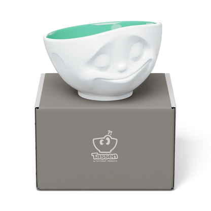 Premium porcelain bowl in white with jade color on the inside from the porcelain product family of fun dishware by FIFTYEIGHT Products. Offers 16 oz capacity perfect for serving cereal, soup, snacks and much more. Dishwasher and microwave safe bowl featuring a sculpted ‘happy’ facial expression. Shipped in exclusively designed gift box.