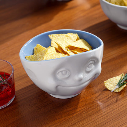 Premium porcelain bowl in white with ocean color inside from the porcelain product family by FIFTYEIGHT Products. Offers 16 oz capacity perfect for serving cereal, soup, snacks and much more. Dishwasher and microwave safe bowl featuring a sculpted ‘dreamy’ facial expression. Shipped in exclusively designed gift box.