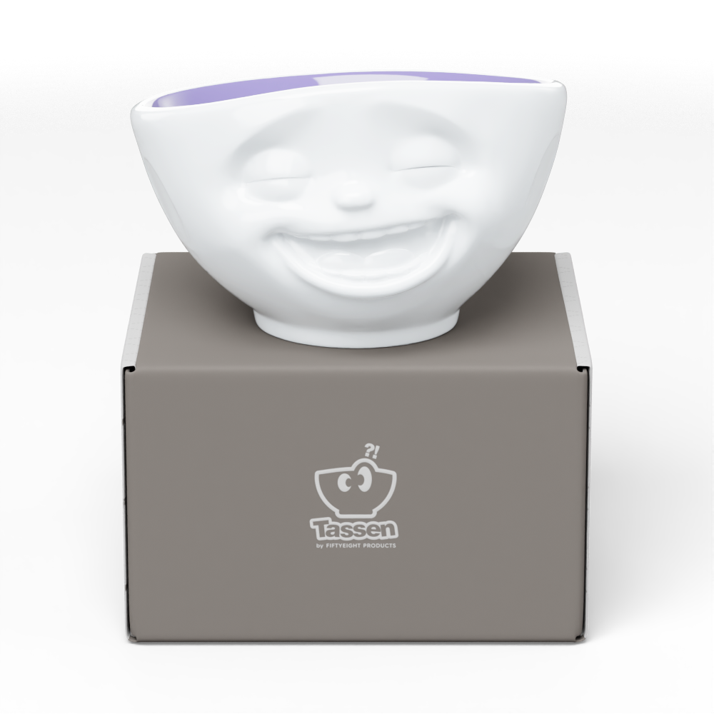 Premium porcelain bowl in white with lavender color inside from the porcelain product family by FIFTYEIGHT Products. Offers 16 oz capacity perfect for serving cereal, soup, snacks and much more. Dishwasher and microwave safe bowl featuring a sculpted ‘laughing’ facial expression. Shipped in exclusively designed gift box.