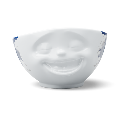 Premium porcelain bowl with colorful accents from TASSEN product family of fun dishware by FIFTYEIGHT Products. Offers 16 oz capacity perfect for serving cereal, soup, snacks and much more. Dishwasher and microwave safe bowl featuring a ‘laughing’ facial expression and colorful artwork in 'heavenly' design. Shipped in gift box.