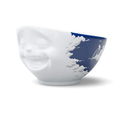 Premium porcelain bowl with colorful accents from TASSEN product family of fun dishware by FIFTYEIGHT Products. Offers 16 oz capacity perfect for serving cereal, soup, snacks and much more. Dishwasher and microwave safe bowl featuring a ‘laughing’ facial expression and colorful artwork in 'heavenly' design. Shipped in gift box.