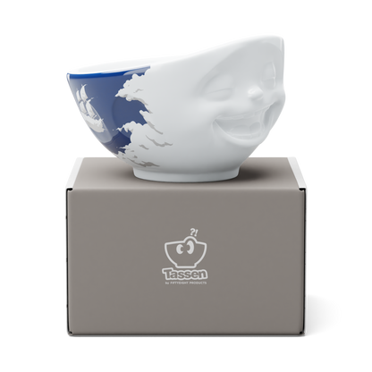 Premium porcelain bowl with colorful accents from TASSEN product family of fun dishware by FIFTYEIGHT Products. Offers 16 oz capacity perfect for serving cereal, soup, snacks and much more. Dishwasher and microwave safe bowl featuring a ‘laughing’ facial expression and colorful artwork in 'heavenly' design. Shipped in gift box.