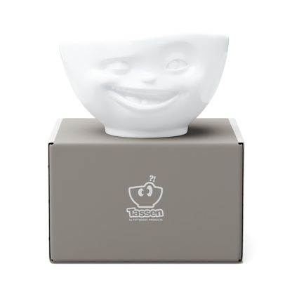 Premium porcelain bowl in white from the porcelain product family of fun dishware by FIFTYEIGHT Products. Offers 16 oz capacity perfect for serving cereal, soup, snacks and much more. Dishwasher and microwave safe bowl featuring a sculpted ‘winking’ facial expression. Shipped in exclusively designed gift box.