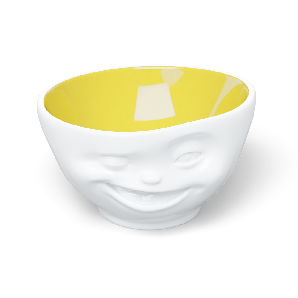 Premium porcelain bowl in white with Saffron Color Inside from the porcelain product family of fun dishware by FIFTYEIGHT Products. Offers 16 oz capacity perfect for serving cereal, soup, snacks and much more. Dishwasher and microwave safe bowl featuring a sculpted ‘winking’ facial expression. Shipped in exclusively designed gift box.