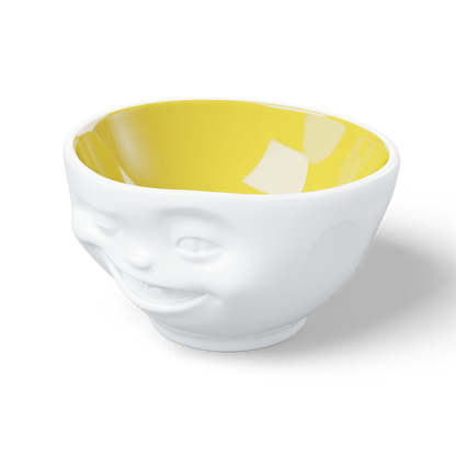 Premium porcelain bowl in white with Saffron Color Inside from the porcelain product family of fun dishware by FIFTYEIGHT Products. Offers 16 oz capacity perfect for serving cereal, soup, snacks and much more. Dishwasher and microwave safe bowl featuring a sculpted ‘winking’ facial expression. Shipped in exclusively designed gift box.