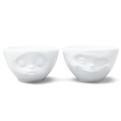 Set of two 3.3 oz. bowls in white from the porcelain product family of fun dishware by FIFTYEIGHT Products. Perfect for serving dips, sauces, nuts, sugar, spices, espresso, jam, honey, and more. Dishwasher and microwave safe bowls featuring 'grinning' and 'kissing' faces. Shipped in exclusively designed gift box.
