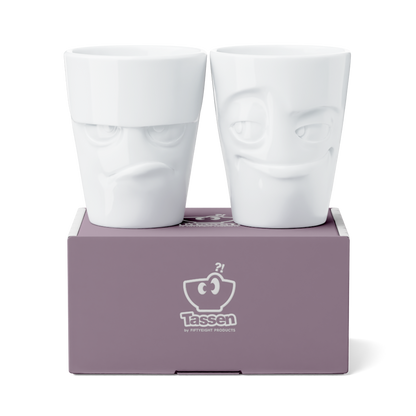 Set of two coffee mugs without handles in white from the porcelain product family of fun dishware by FIFTYEIGHT Products. Each offering 11 oz capacity. Dishwasher and microwave safe coffee cups with 'Grumpy' and 'Impish' facial expression. Shipped in exclusively designed gift box.
