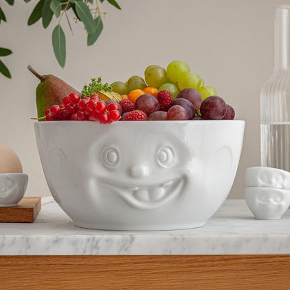 Extra big porcelain bowl in white from the porcelain product family of fun dishware by FIFTYEIGHT Products. Offers 87.5 oz capacity for serving salads, sides, stew, chili, chips, and more. Dishwasher and microwave safe bowl featuring a sculpted ‘out of control’ facial expression. Shipped in exclusively designed gift box.