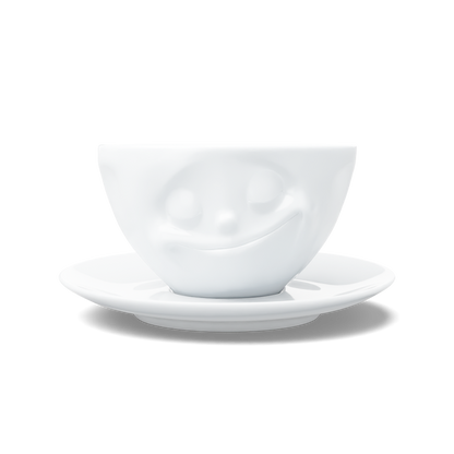 Premium porcelain coffee cup with saucer in white from the porcelain product family of fun dishware by FIFTYEIGHT Products. Offers 6.5 oz capacity and comes with a matching saucer. Dishwasher and microwave safe cup with a 'happy' facial expression. Shipped in exclusively designed gift box.