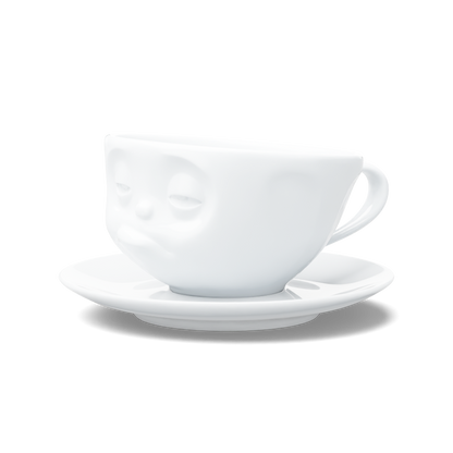 Premium porcelain coffee cup with saucer in white from the porcelain product family of fun dishware by FIFTYEIGHT Products. Offers 6.5 oz capacity and comes with a matching saucer. Dishwasher and microwave safe cup with a ''snoozy' facial expression. Shipped in exclusively designed gift box.
