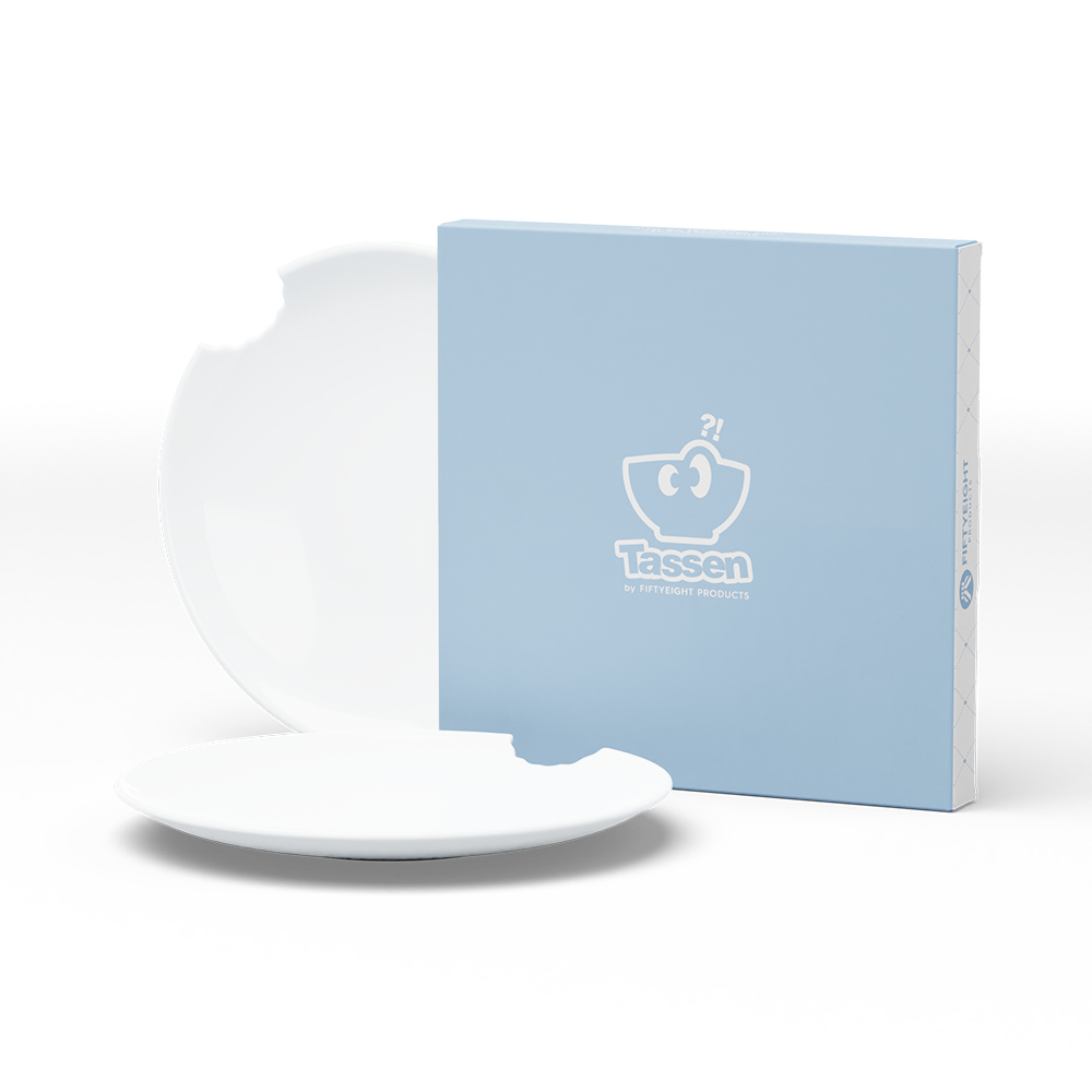 Set of two premium porcelain dessert plates in white with a 'bite mark' cutout at the edge. Dishwasher and microwave safe plate with a 7.8 inch diameter. From the porcelain product family of fun dishware by FIFTYEIGHT Products. Made in Germany according to environmental standards.