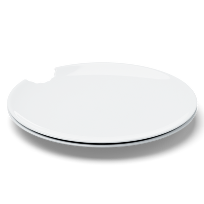 Set of two premium porcelain dinner plates in white with a 'bite mark' cutout at the edge. Dishwasher and microwave safes plate with a 11 inch diameter. From the porcelain product family of fun dishware by FIFTYEIGHT Products. Made in Germany according to environmental standards.