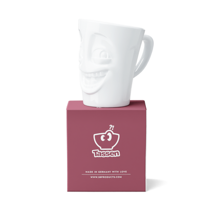 Premium porcelain coffee mug with handle from the porcelain product family of fun dishware by FIFTYEIGHT Products. Offers 11 oz capacity for serving coffee, tea, latte, matcha, soup and more. Dishwasher and microwave safe cup with a 'joking' facial expression. Shipped in exclusively designed gift box.