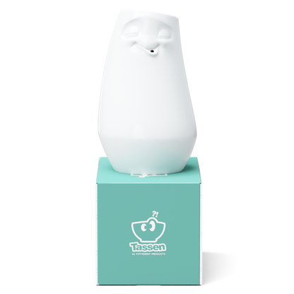 Exclusive designer flower vase made from premium porcelain with a 'laid back' facial expression. Stands at 9 inches tall on a footed base. From the porcelain product family of fun dishware by FIFTYEIGHT Products. Made in Germany according to environmental standards.