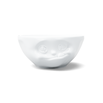 Premium porcelain bowl in white from the porcelain product family of fun dishware by FIFTYEIGHT Products. Offers 11 oz capacity perfect for serving ice cream to tapas, nuts and hearty dips. Dishwasher and microwave safe bowl featuring a sculpted ‘tasty’ facial expression. Shipped in exclusively designed gift box.