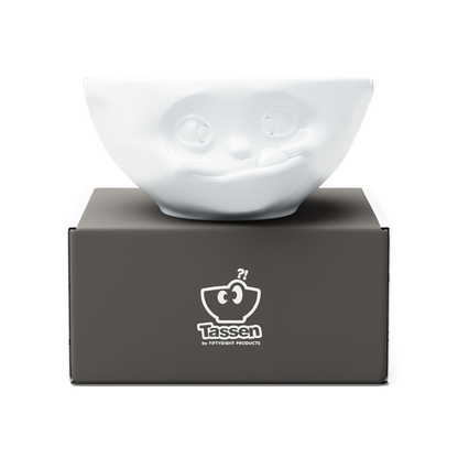 Premium porcelain bowl in white from the porcelain product family of fun dishware by FIFTYEIGHT Products. Offers 11 oz capacity perfect for serving ice cream to tapas, nuts and hearty dips. Dishwasher and microwave safe bowl featuring a sculpted ‘tasty’ facial expression. Shipped in exclusively designed gift box.