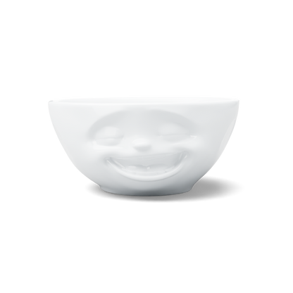 Premium porcelain bowl in white from the porcelain product family of fun dishware by FIFTYEIGHT Products. Offers 11 oz capacity perfect for serving ice cream to tapas, nuts and hearty dips. Dishwasher and microwave safe bowl featuring a sculpted ‘laughing’ facial expression. Shipped in exclusively designed gift box.