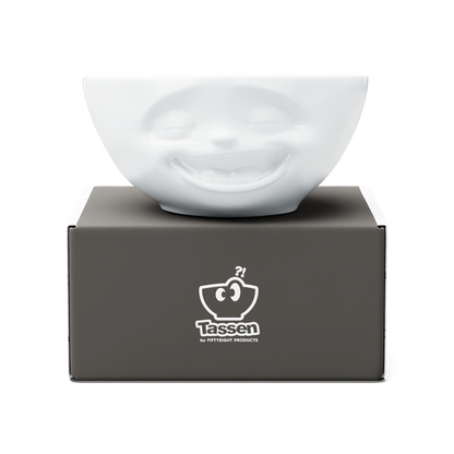 Premium porcelain bowl in white from the porcelain product family of fun dishware by FIFTYEIGHT Products. Offers 11 oz capacity perfect for serving ice cream to tapas, nuts and hearty dips. Dishwasher and microwave safe bowl featuring a sculpted ‘laughing’ facial expression. Shipped in exclusively designed gift box.