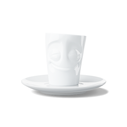 Premium porcelain espresso cup with saucer in white from the porcelain product family of fun dishware by FIFTYEIGHT Products. Offers 2.7 oz capacity and comes with a matching saucer. Dishwasher and microwave safe cup with an 'cheery' facial expression. Shipped in exclusively designed gift box.