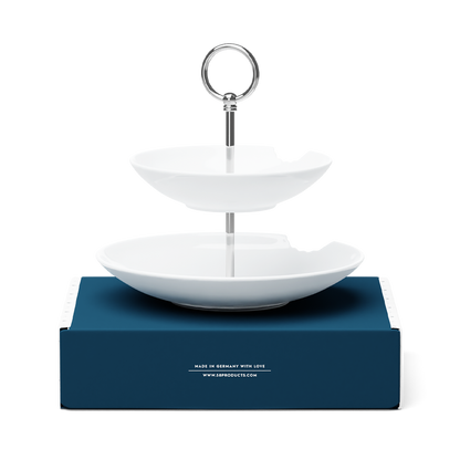 The two-Tiered Serving Platter brings tons of fun to the table. Features two deep plates with fun bite marks mounted on a pole. Perfect for building a grand seafood tower! From the porcelain product family of fun dishware by FIFTYEIGHT Products. Made in Germany according to environmental standards.