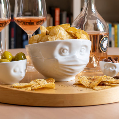 Premium porcelain bowl in white from the porcelain product family of fun dishware by FIFTYEIGHT Products. Offers 16 oz capacity perfect for serving cereal, soup, snacks and much more. Dishwasher and microwave safe bowl featuring a sculpted ‘hopeful’ facial expression and mask. Shipped in exclusively designed gift box.