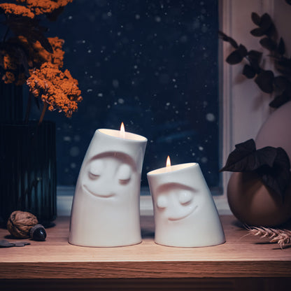 Exclusive designer candle holder with CUDDLY facial expression. Stands at 4.4 inches tall on a footed base and fits a tea light or LED light. From the TASSEN product family of fun dishware by FIFTYEIGHT Products. Made in Germany according to environmental standards.