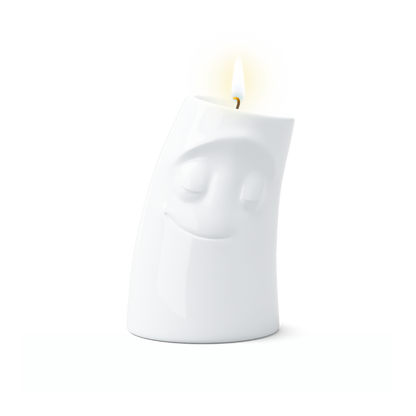 Exclusive designer candle holder with CUDDLY facial expression. Stands at 4.4 inches tall on a footed base and fits a tea light or LED light. From the TASSEN product family of fun dishware by FIFTYEIGHT Products. Made in Germany according to environmental standards.